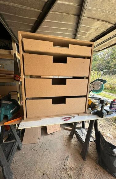 Custom MDF drawer unit built in Woodford Green workshop with handleless finger pulls.