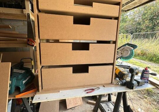 Custom MDF drawer unit built in Woodford Green workshop with handleless finger pulls.