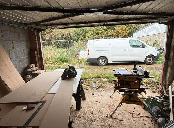 Joinery workshop setup in Woodford Green showing furniture fabrication in progress.