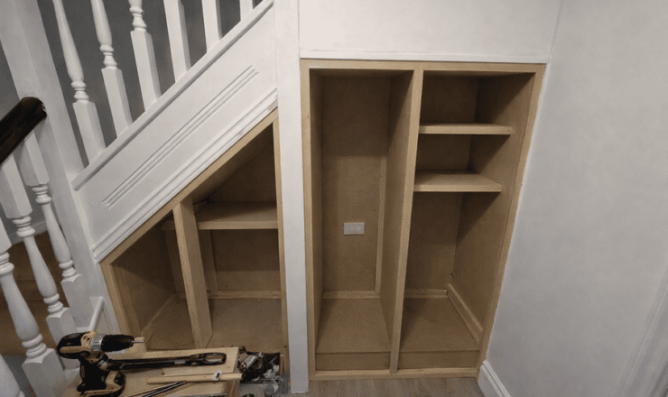 Under-stairs storage carcass and shelving fitted, ready for doors and finishing.