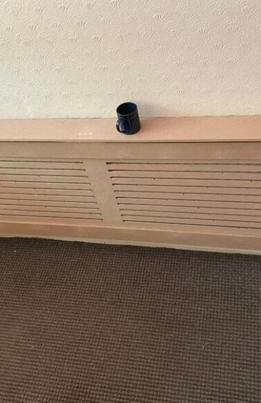 Custom MDF radiator cover with slatted front grille built in Clayhall.